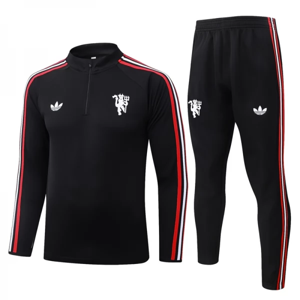 Manchester United Trenirka Dječji 2026/27 - 1-4 Zip Crna Manchester United Trenirka Dječji 2026/27 - 1-4 Zip Crna