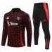 Manchester United Trenirka Komplet 2024/25 - 1-4 Zip Crvena Crna